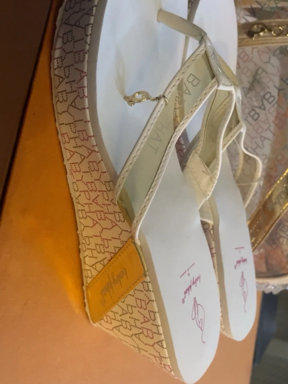 Baby Phat White Wedge Thong Sandals with Gold Accents